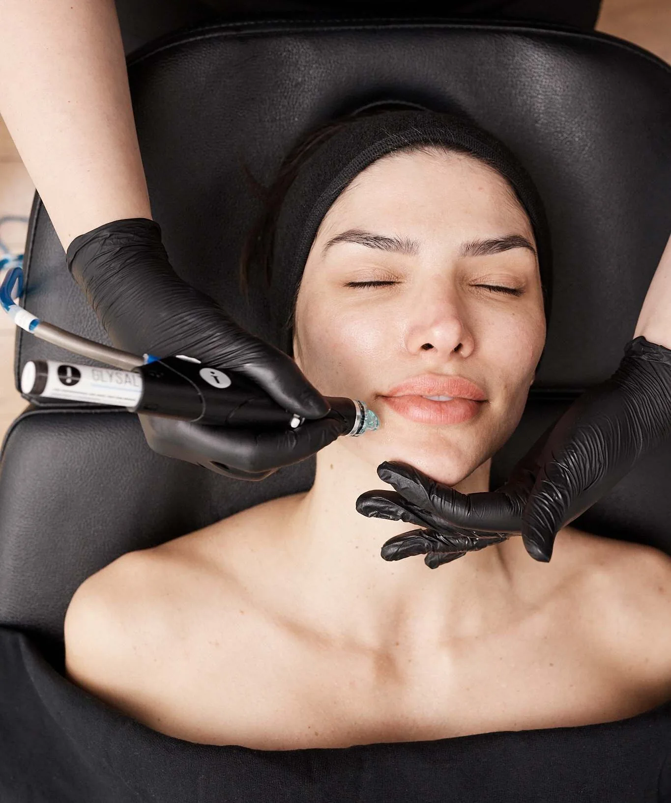 Client relaxing during a HydraFacial at Future Face & Body