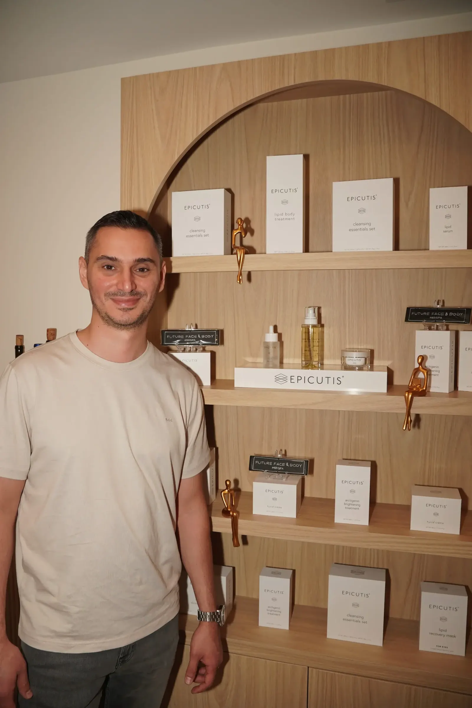 Russ Aminov, NP, at the Future Face & Body front desk on West 72nd Street